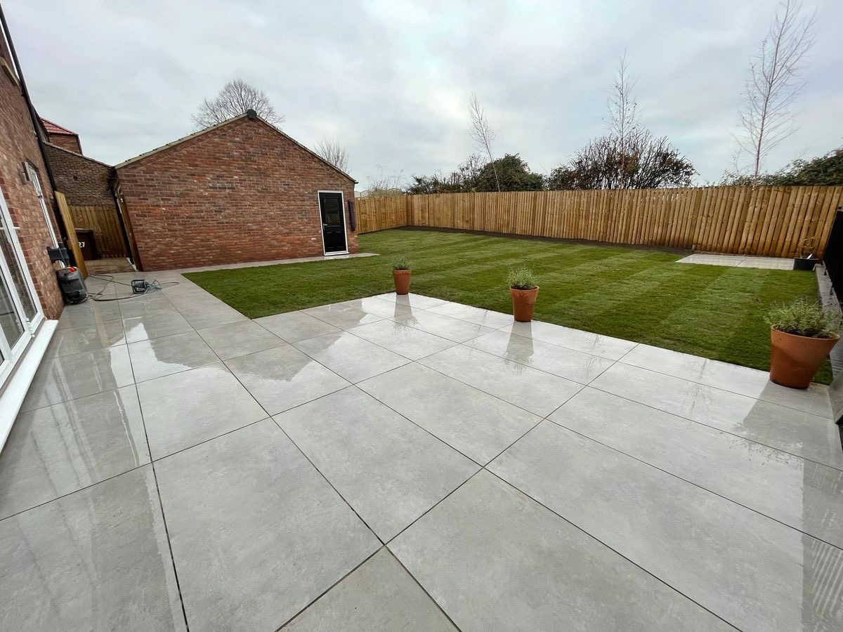 Clean paved garden zone with retaining edges