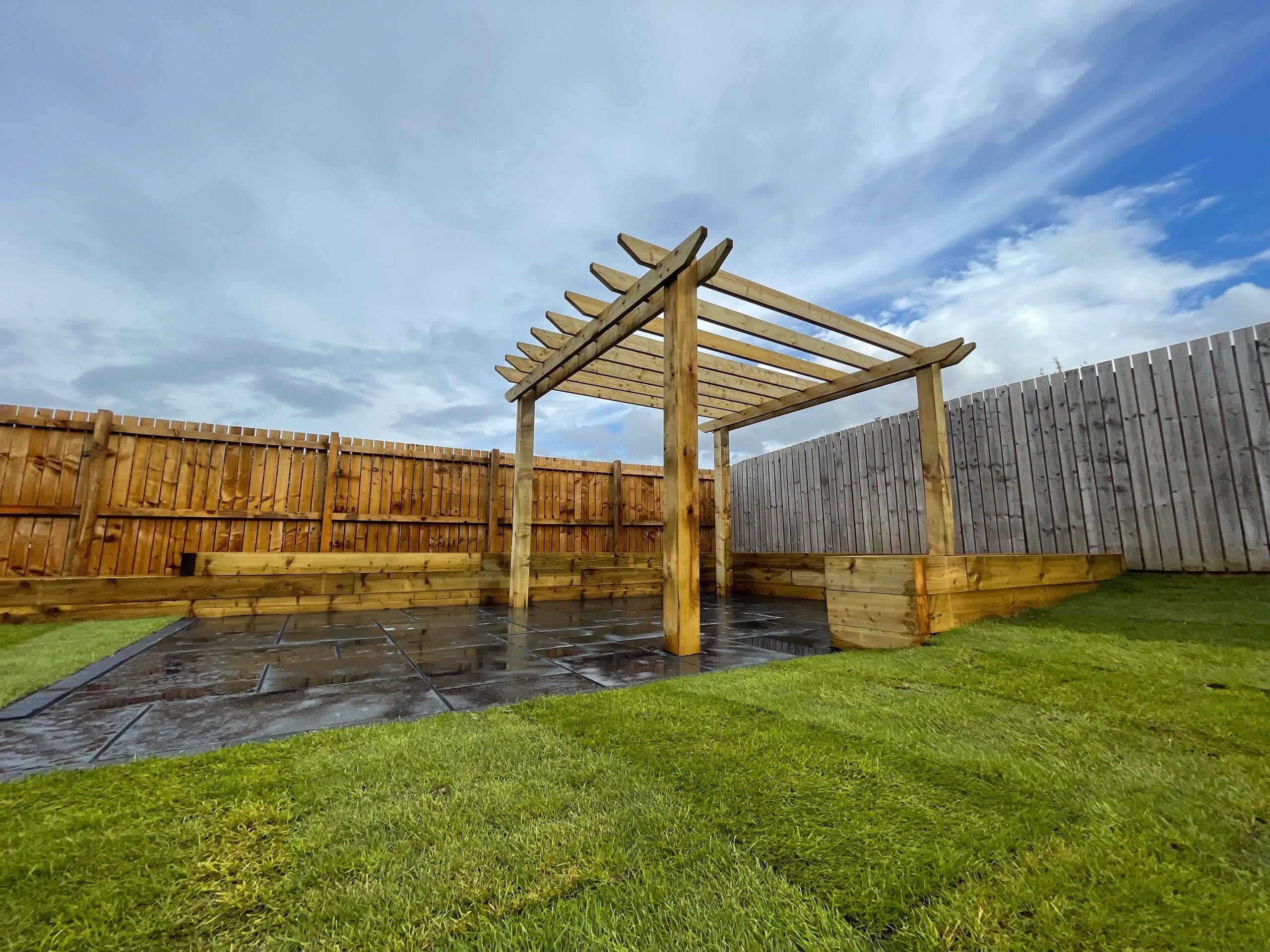 Completed landscape garden with paved outdoor area