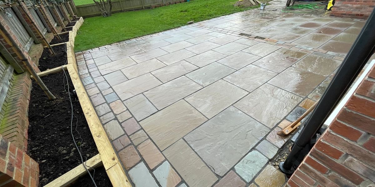 Modern patio installation with clean stonework